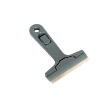 Skrobak z wymiennym ostrzem i zatrzaskiem